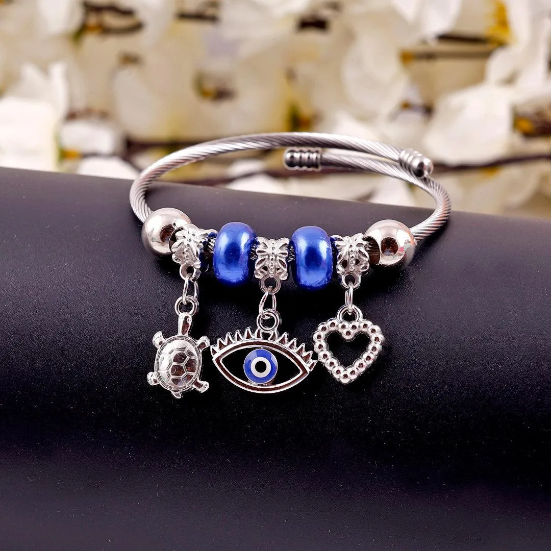 Silver Charm Bracelet with Blue Beads and Silver Charms